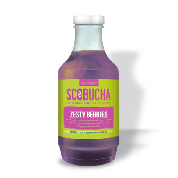 A bottle of soda with zesty berries on it.