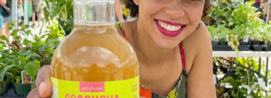 Women in the farmers market drinking Scobucha